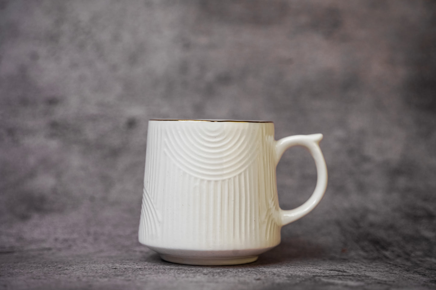 Textured White Teacup with Gold Rim - Modern Ceramic Design