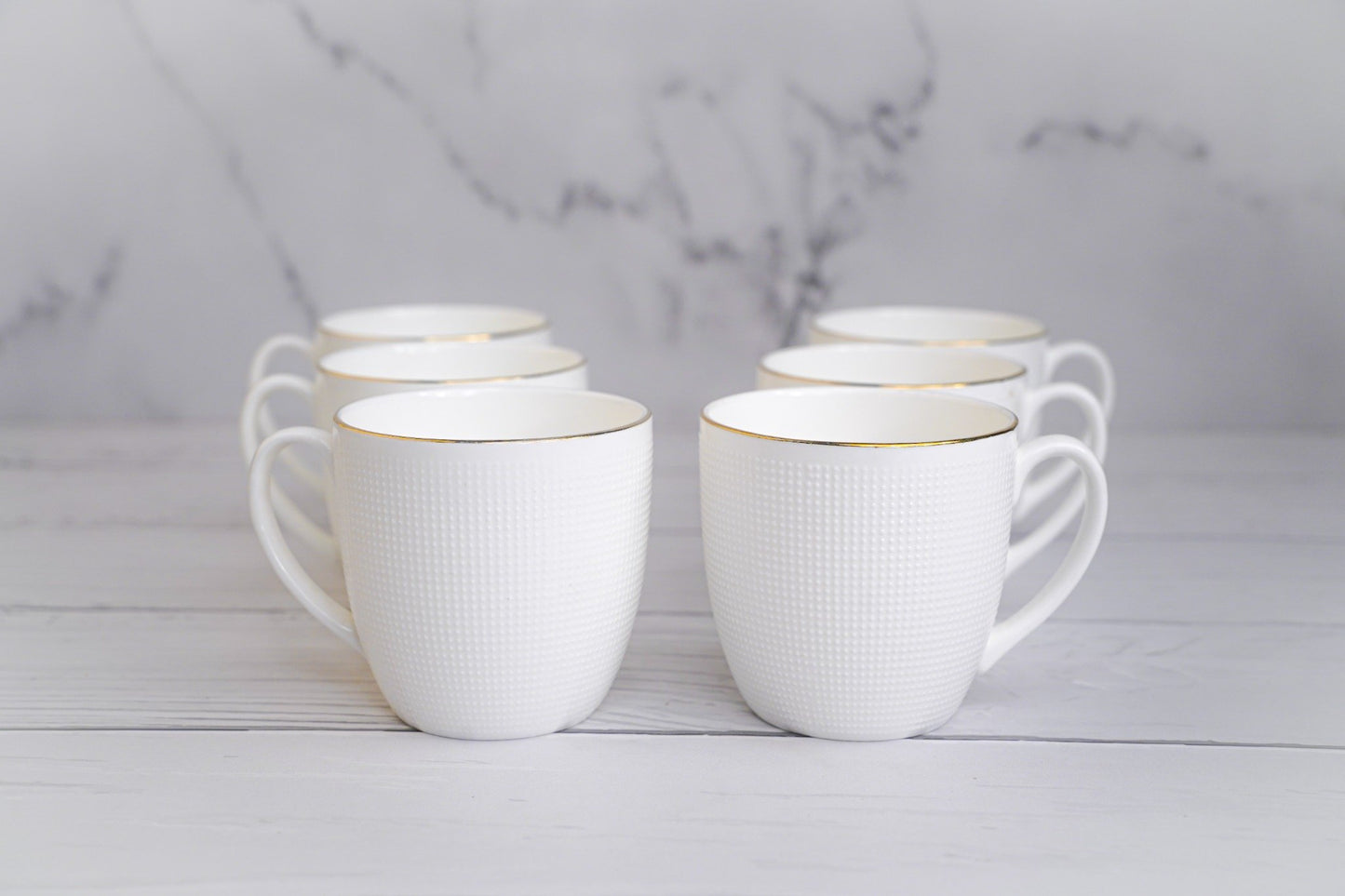 White teacups with gold trim, elegant set of 6, perfect for tea