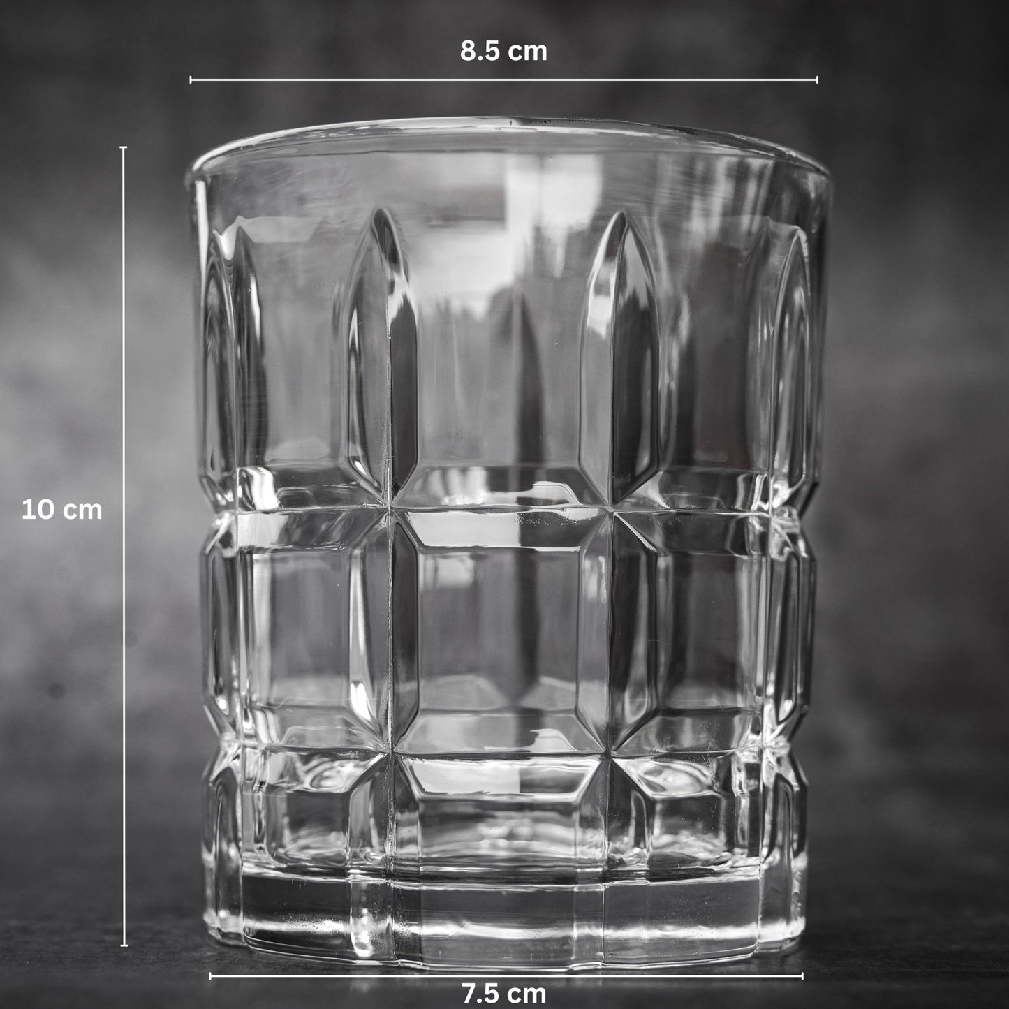 Prismatic Cut Drinking Glass with Geometric Design