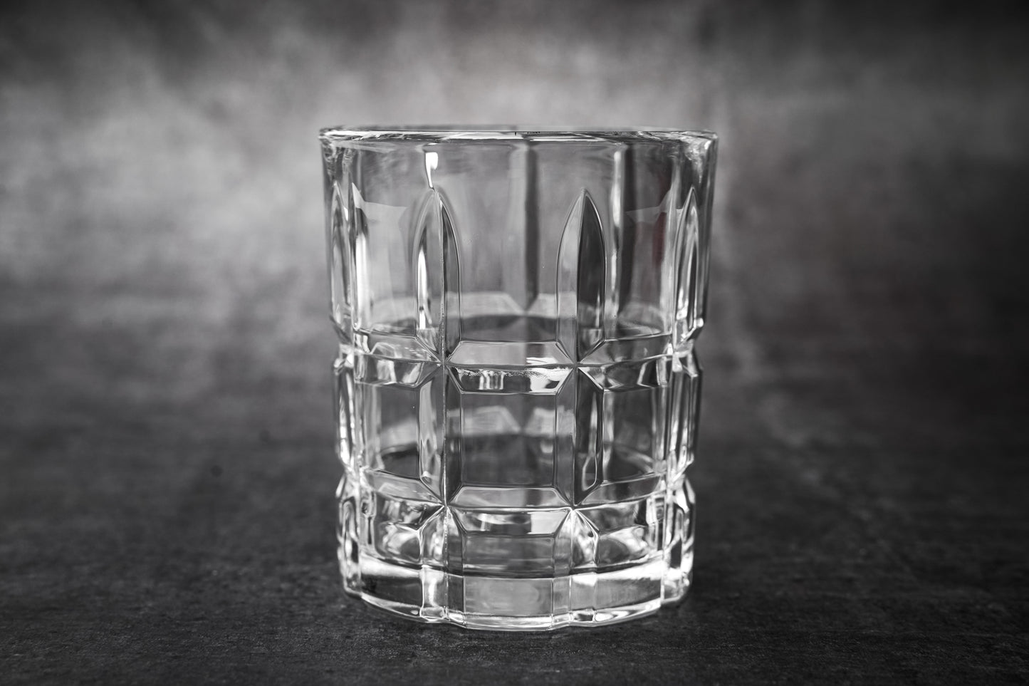 Prismatic Cut Drinking Glass with Geometric Design