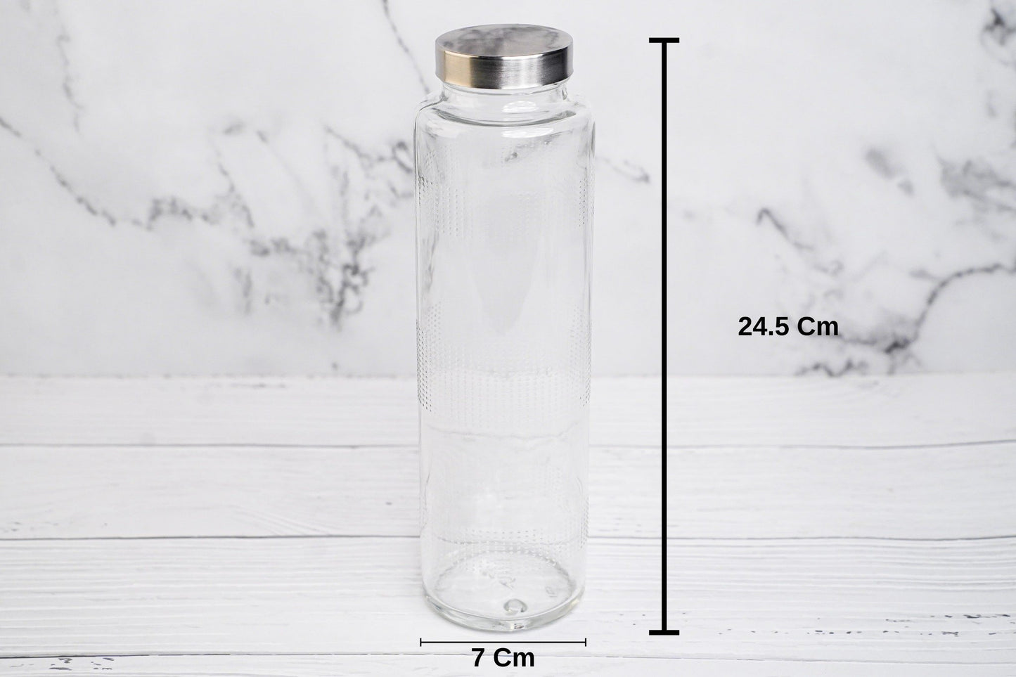 Glass water bottle with metal cap, eco-friendly and reusable for everyday hydration
